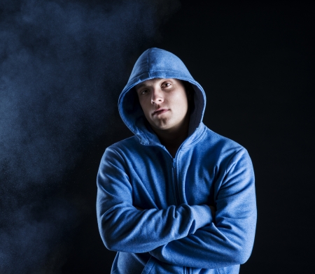Young fitness fashion model is posing in studio on black background の写真素材