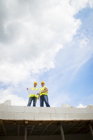 Construction Contractors building a big new homeの写真素材