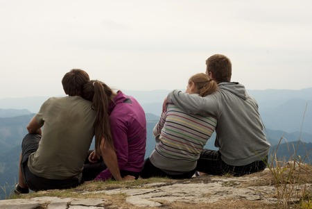 Hikers on the top of mountainsの写真素材