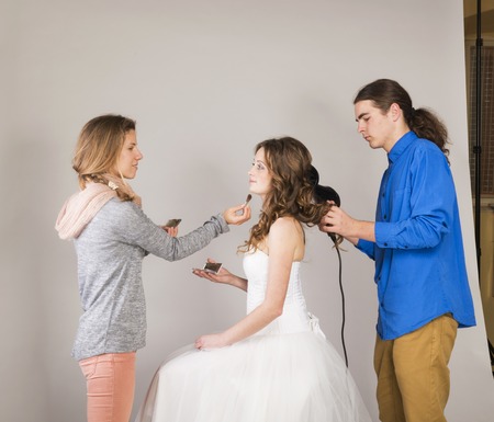 Studio portraits with beautiful bride makeup artist and hairdresser