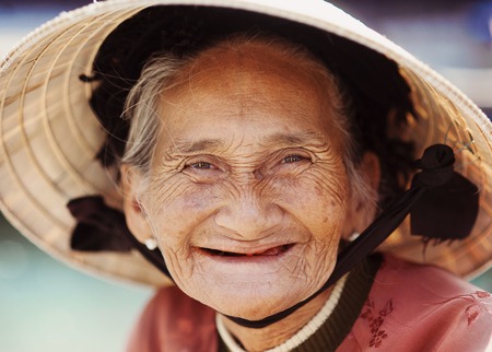 Close up face of beautiful smiling woman with wrinkles  Elderly senior の写真素材