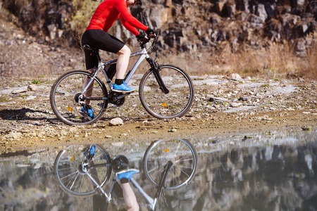 Mountain bike cyclist is ridding outdoor の写真素材