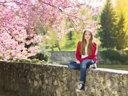 Beautiful girl at the park の写真素材