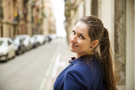Pretty young female tourist is enjoying vacation in Barcelona city, Spain の写真素材