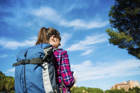 Girl tourist with her bag pack 
