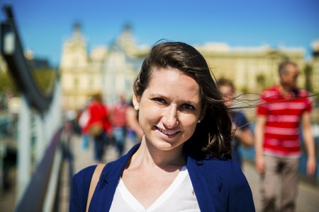 Happy young female tourist is enjoying vacation in Barcelona, Spain の写真素材