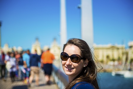 Happy young female tourist is enjoying vacation in Barcelona, Spain の写真素材