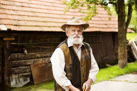 Senior man at his farm の写真素材
