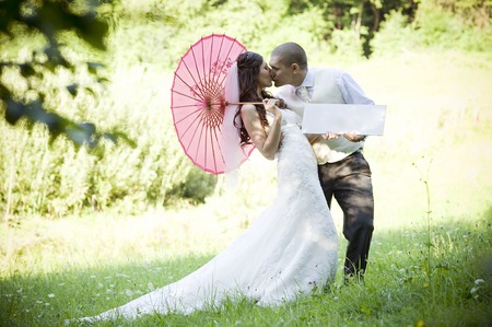 Happy bride and groom on their wedding dayの写真素材
