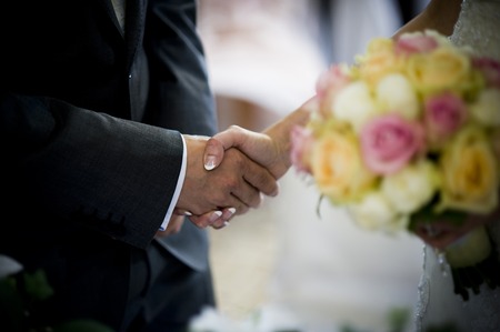 Bride and groom in church at the wedding dayの写真素材