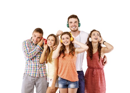 Group of young people listening to the music, isolated on white background 