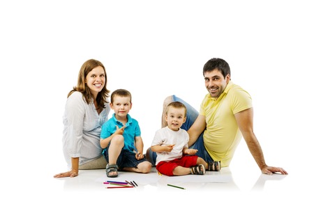 Portrait of the happy family with two children and pregnant mother drawing, isolated on white backgroundの写真素材