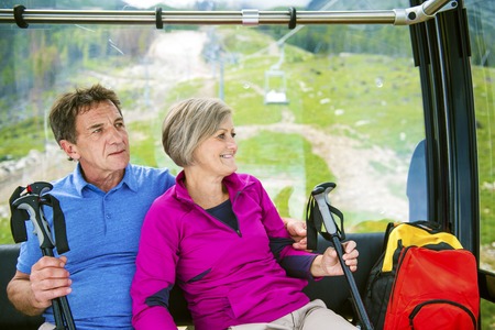 Senior couple with hiking equipment  の写真素材