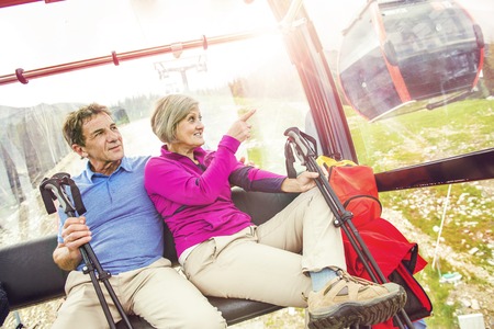 Senior couple with hiking equipment の写真素材