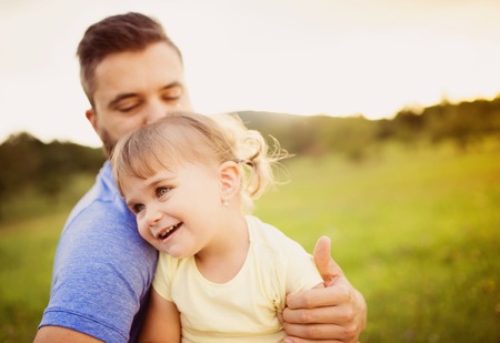 Father and daughter in natureの写真素材