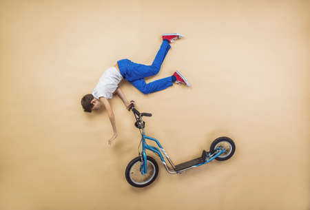 Boy is playing. Lying on the floor.の写真素材