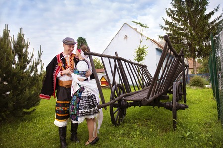 Love couple wearing traditional Eastern Europe folk costumes.の写真素材