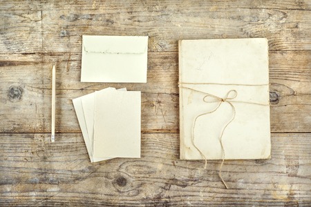 Stationery set on a wooden floor background. View from above.の写真素材