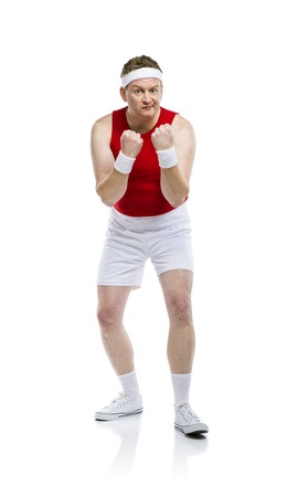 Funny weak sportsman exercising. Studio shot on white background.の写真素材
