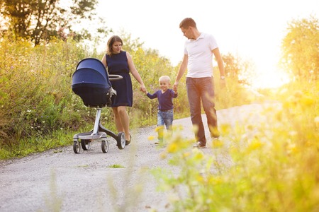 Happy family on a walk in nature enjoying life together.