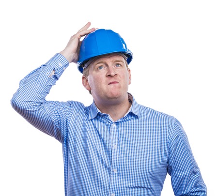 Engineer in blue hard hat. Studio shot on white background.の写真素材