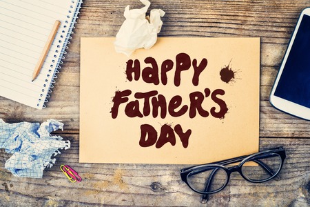 Office desk with Happy fathers day sign. View from above.の写真素材