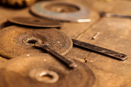 Circular saw discs laid on a table in a welding factoryの写真素材