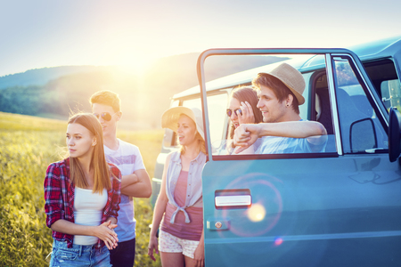 Young hipster friends on road trip on a summer dayの写真素材