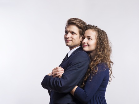 Beautiful young hipster couple. Studio shot on white backgroundの写真素材