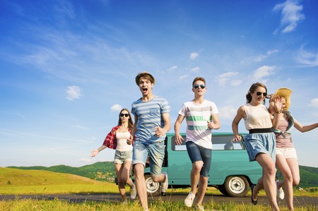 Young hipster friends on road trip on a summers dayの写真素材