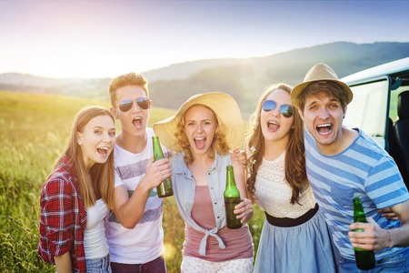 Young hipster friends on road trip on a summer dayの写真素材