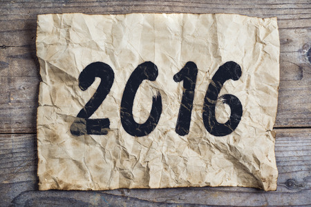 Happy new year composition. Studio shot on wooden background.の写真素材