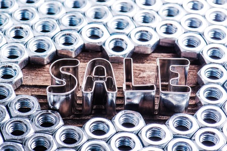 Sale composition. Studio shot on wooden background.の写真素材