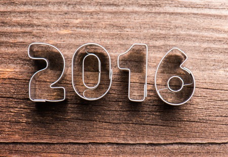 Happy new year composition. Studio shot on wooden background.の写真素材