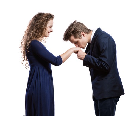 Beautiful young couple in love. Studio shot on white backgroundの写真素材