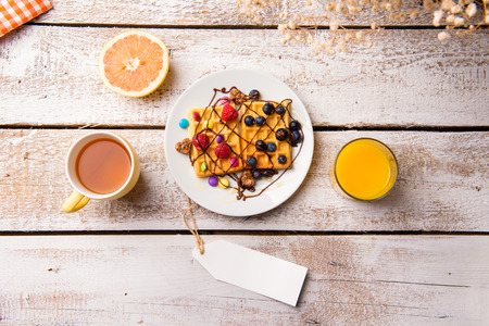 Breakfast meal. Empty tag. Studio shot on white wooden background. Copy space.の写真素材
