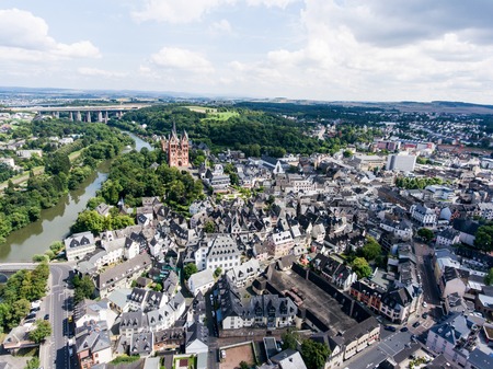 Aerial view of Dutch town with church, river, bridge and white historical buildingsの写真素材
