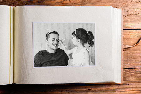 Fathers day concept. Photo album, black-and-white picture.の写真素材