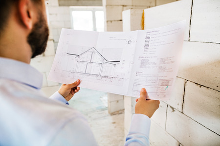 Architect or civil engineer at the construction site.