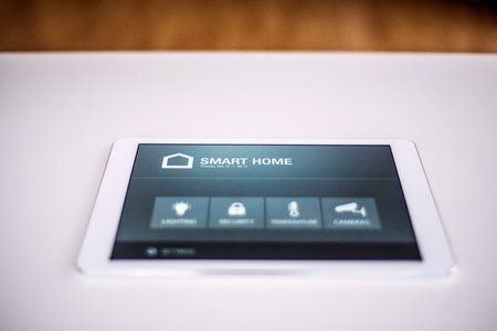 A tablet with smart home screen.の写真素材