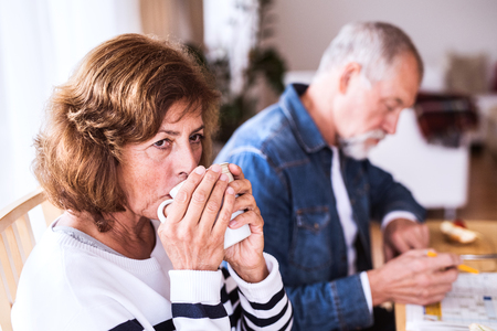Senior couple relaxing at home.の写真素材