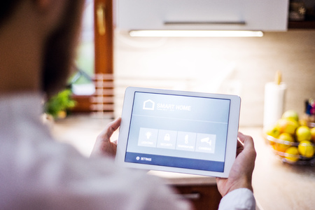 A tablet with smart home screen.の写真素材