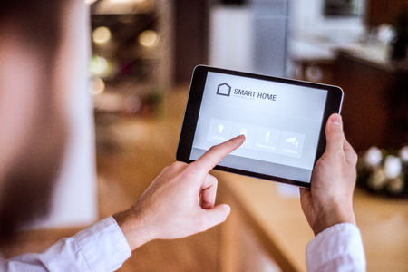 A tablet with smart home screen.