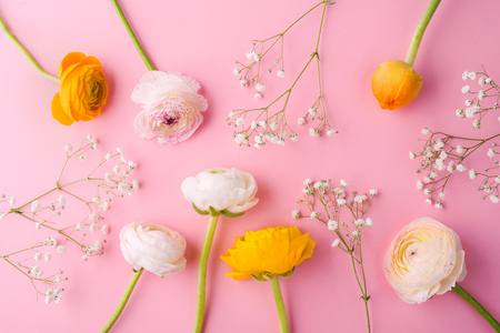 Easter and spring flat lay on a pink bacground.