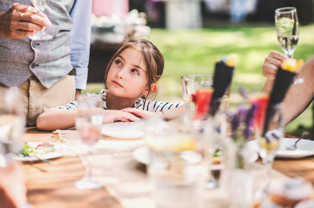 Family celebration or a garden party outside in the backyard.の写真素材