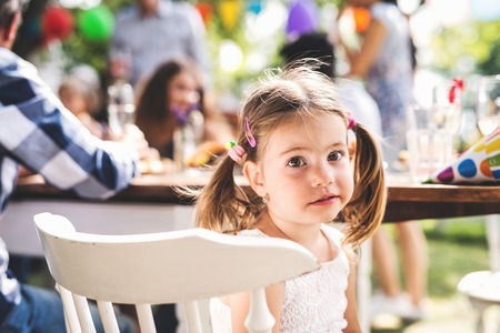 Family celebration or a garden party outside in the backyard.の写真素材