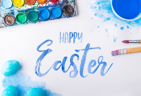 Happy Easter flat lay on a white background.の写真素材