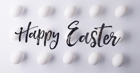 Happy Easter flat lay on a white background.の写真素材