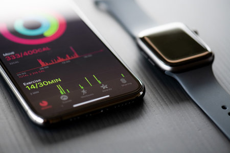 NOVA BANA, SLOVAKIA - NOV 12, 2019: New Apple Watch Series 5 and iPhone 11 Pro smartphone.のeditorial素材