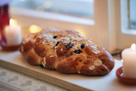 Close-up of sweet Christmas bread on window sill.